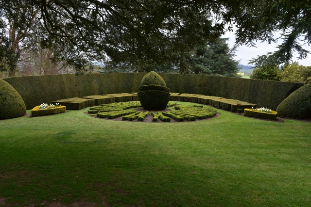 Box hedge sun dial in Ascott House garden on the buckinghamshire bedfordshire border © essentially-england.com