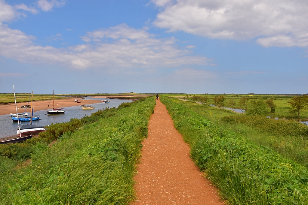 The Norfolk Coast Path out of Burnham Overy Staithe © essentially-england.com