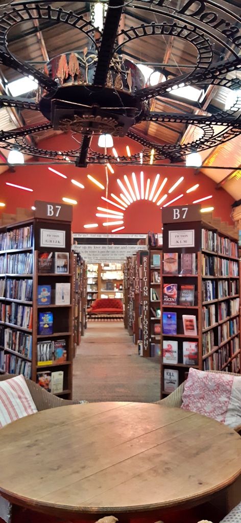 Shelves of Books, Quotes, Murals, and Railway Paraphernalia at Barter Books © essentially-england.com