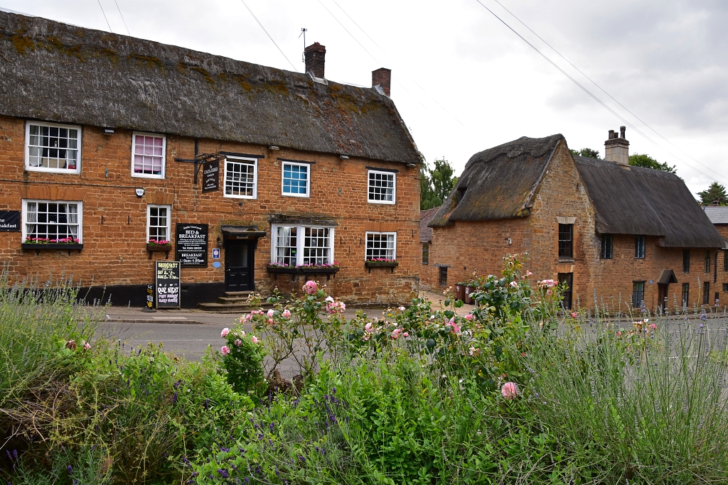 The Coach and Horses Pub and The Pound House, Numbers 30 and 29 on the Brixworth Heritage Trail  © essentially-england.com