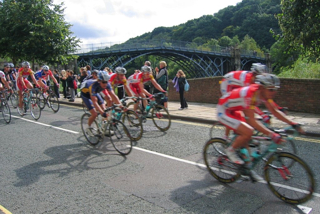 The Tour of Britain Cycle Race Flashes Through Ironbridge © essentially-england.com