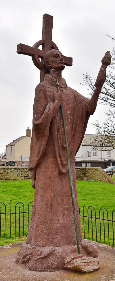 St Aidan Statue on the Holy Island of Lindisfarne © essentially-england.com