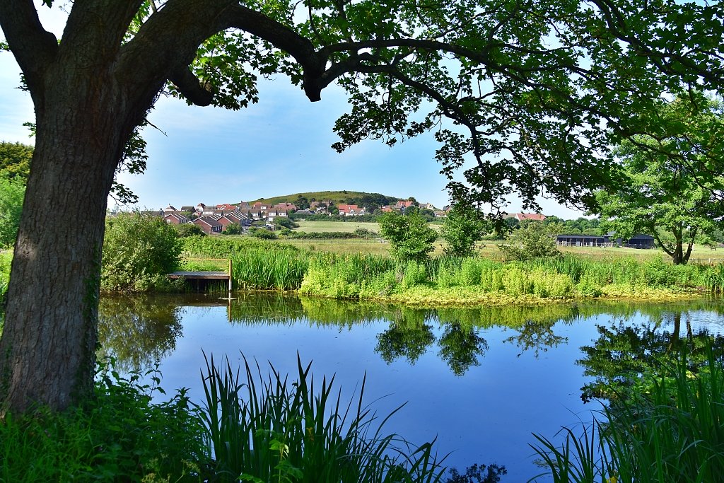 The View From Beeston Regis Priory Towards Beeston Bump © essentially-england.com