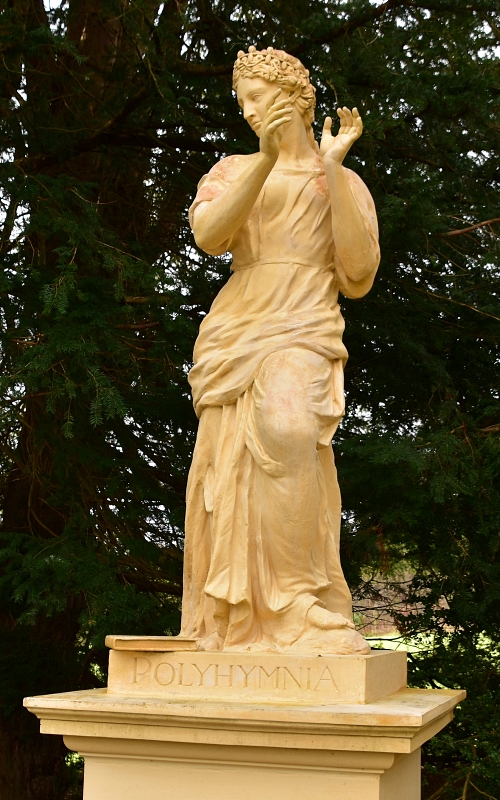 Polyhymnia Statue Beside the Doric Arch in Stowe Gardens © essentially-england.com