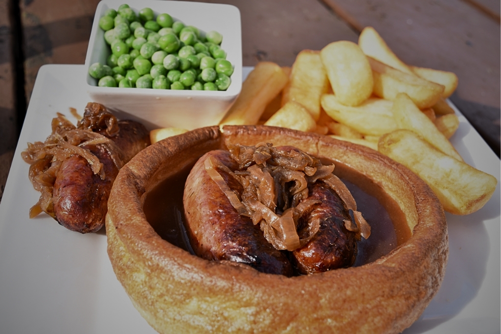 Yorkshire Pudding with Sausages and Gravy © essentially-england.com